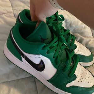 Green and white Jordan’s